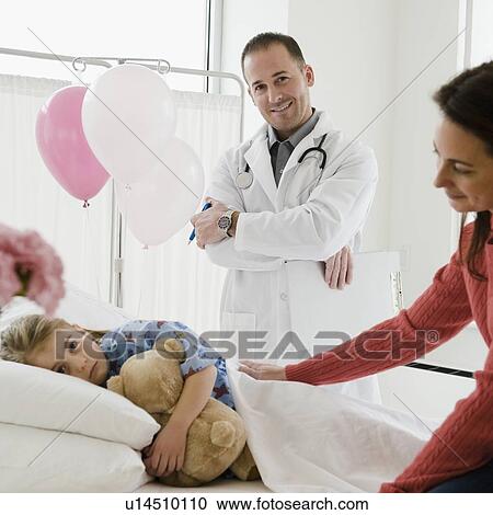 Young girl in hospital bed View Large Photo Image Stock Image - Young girl in hospital bed. Fotosearch