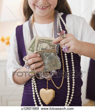 Young girl playing dress-up View Large Photo Image Stock Photo - Young girl playing dress-up. Fotosearch