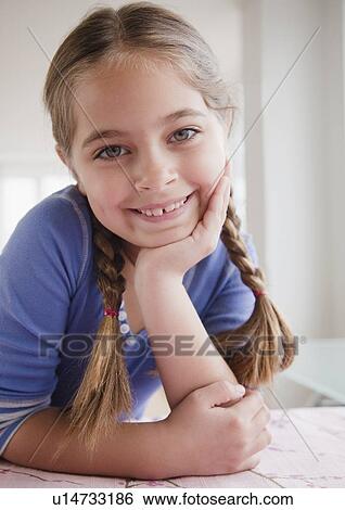 Stock Photograph - Young girl. Fotosearch