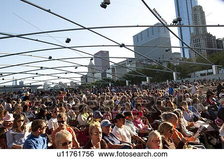 Stock Photograph - Audience in Chicago, The Pritzker Pavilion. Fotosearch