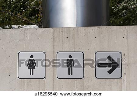 Stock Image - Chicago, direction signs at The Pritzker Pavilion. Fotosearch