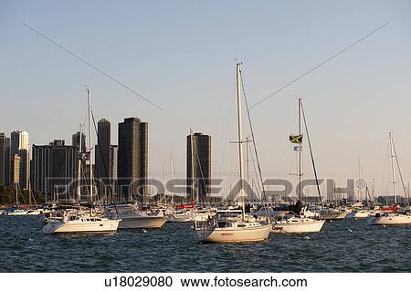 Chicago skyline and boats on Lake Michigan View Large Photo Image Stock Image - Chicago skyline and boats on Lake Michigan. Fotosearch