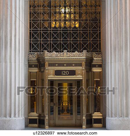 Stock Photo - Guilded entrance of a Chicago Building. Fotosearch