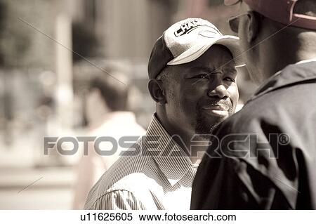 Stock Photography - Man on the streets in Chicago. Fotosearch