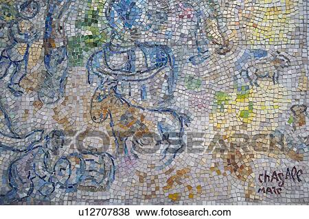 Stock Photo - Painted mosaic tiles on a wall in Chicago. Fotosearch