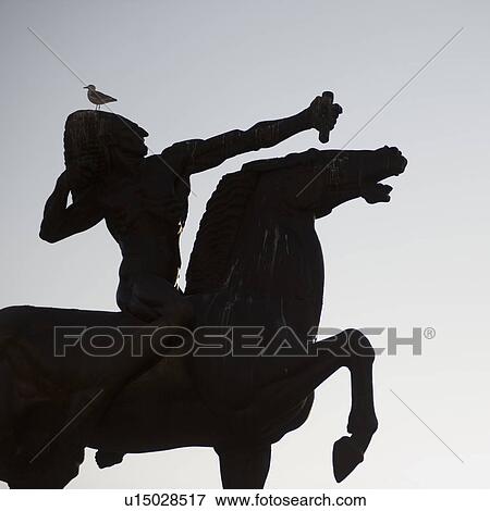 Stock Photo - Silhouette of Statue monument in Chicago. Fotosearch