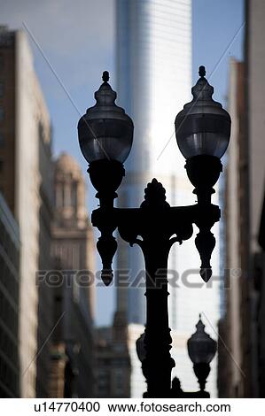 Stock Image - Street lamps and Chicago Trump Tower. Fotosearch