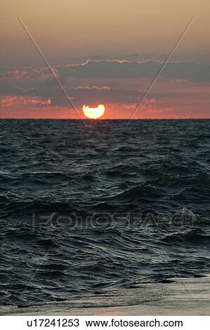 Stock Image - Sunset in Chicago, Lake Michigan. Fotosearch