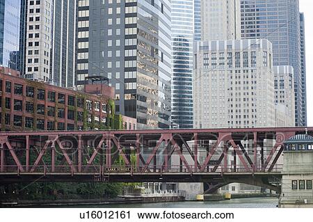 Stock Image - Walkway over river in Chicago. Fotosearch