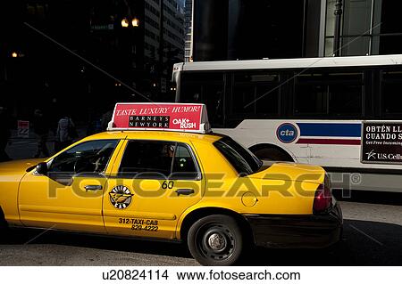 Yellow taxi on Chicago Street View Large Photo Image Picture - Yellow taxi on Chicago Street. Fotosearch
