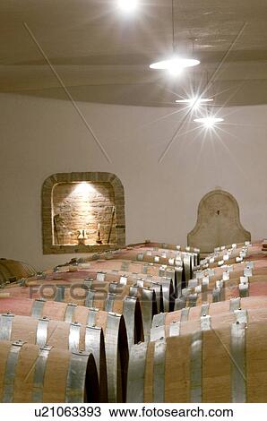 Barrels of wine in a cellar View Large Photo Image Stock Image - Barrels of wine in a cellar. Fotosearch