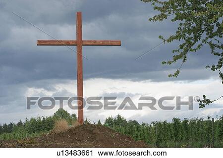 a cross on a hill View Large Photo Image Stock Image - a cross on a hill. Fotosearch