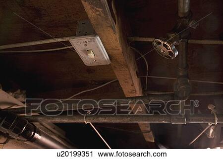a furnace switch, valve and pipes in a ceiling View Large Photo Image Stock Image - a furnace switch, valve and pipes in a ceiling. Fotosearch