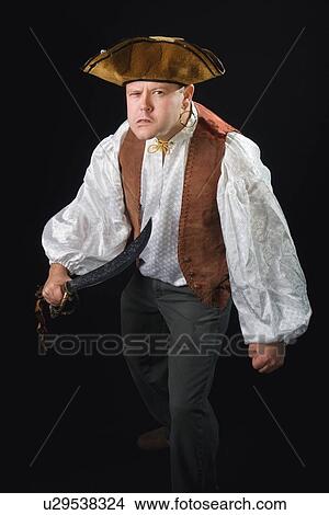Picture - a man dressed as a pirate. Fotosearch