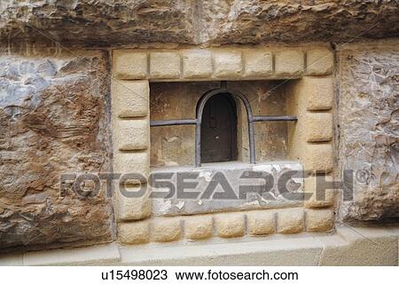 a miniature door in a stone wall View Large Photo Image Stock Image - a miniature door in a stone wall. Fotosearch