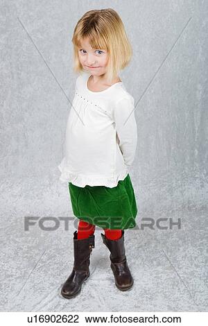 a young girl dressed for christmas View Large Photo Image Stock Image - a young girl dressed for christmas. Fotosearch