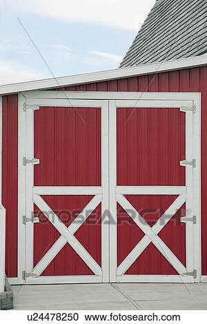 Stock Image - alberta, canada; red barn with white trim. Fotosearch