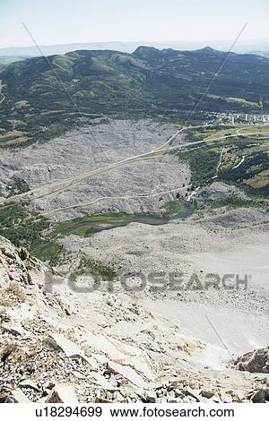 crowsnest pass, alberta, canada; looking down from the mountain peak at frank slide on turtle mountain View Large Photo Image Stock Photo - crowsnest pass, alberta, canada; looking down from the mountain peak at frank slide on turtle mountain. Fotosearch