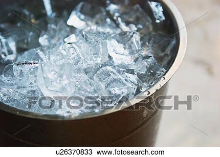 ice in a bucket View Large Photo Image Stock Image - ice in a bucket. Fotosearch