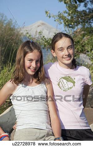 kananaskis country, alberta, canada; two girls together in the mountains View Large Photo Image Stock Photo - kananaskis country, alberta, canada; two girls together in the mountains. Fotosearch