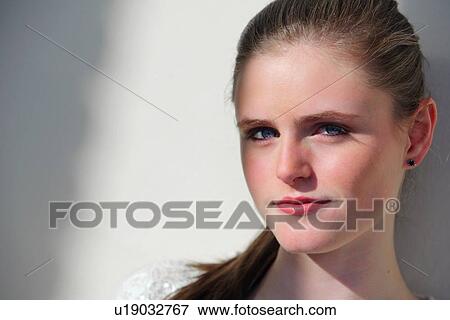 Stock Photo - portrait of a young woman. Fotosearch