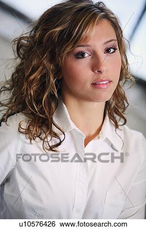 portrait of a young woman View Large Photo Image Stock Photograph - portrait of a young woman. Fotosearch