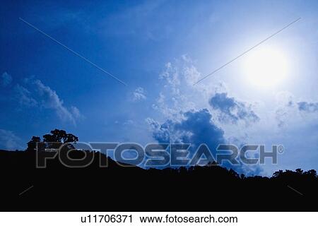 the sun shining through the clouds View Large Photo Image Stock Image - the sun shining through the clouds. Fotosearch