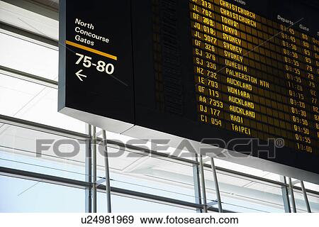 Stock Photo - Airport Departure Board. Fotosearch