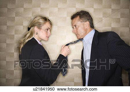 Angry Businesswoman Pulling Man's Tie View Large Photo Image Stock Image - Angry Businesswoman Pulling Man's Tie. Fotosearch