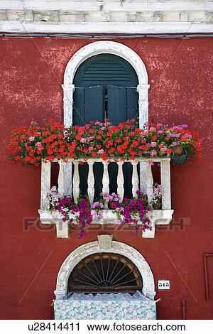 Arched Window with Balcony and Flowers View Large Photo Image Stock Image - Arched Window with Balcony and Flowers. Fotosearch