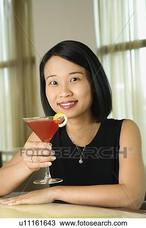 Attractive Young Woman Smiling with Beverage View Large Photo Image Stock Image - Attractive Young Woman Smiling with Beverage. Fotosearch