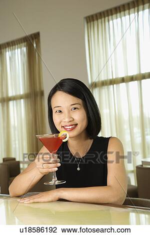Attractive Young Woman Smiling with Beverage View Large Photo Image Stock Image - Attractive Young Woman Smiling with Beverage. Fotosearch