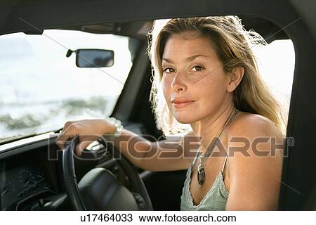 Blonde Woman Sitting in Car View Large Photo Image Stock Image - Blonde Woman Sitting in Car. Fotosearch