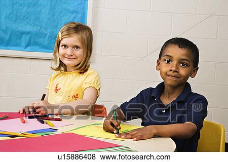 Boy and Girl in Art Class View Large Photo Image Stock Photo - Boy and Girl in Art Class. Fotosearch
