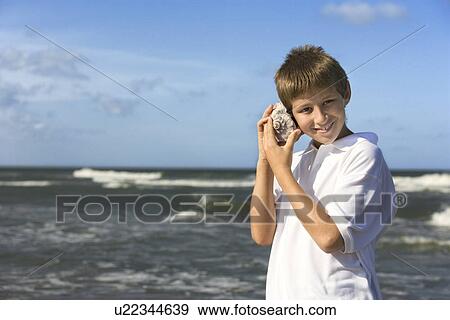 Boy at the Beach View Large Photo Image Stock Photo - Boy at the Beach. Fotosearch