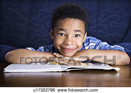 Boy Doing Homework View Large Photo Image Stock Photograph - Boy Doing Homework. Fotosearch