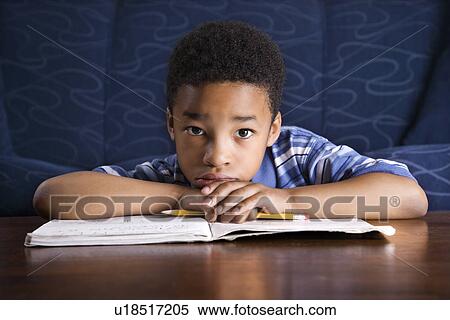 Boy Doing Homework View Large Photo Image Stock Photography - Boy Doing Homework. Fotosearch