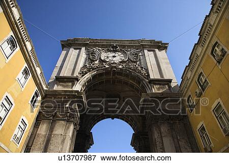 Building Arch with Clock in Lisbon View Large Photo Image Stock Photo - Building Arch with Clock in Lisbon. Fotosearch