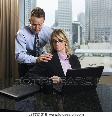 Stock Photograph - Businessman Annoying Businesswoman. Fotosearch