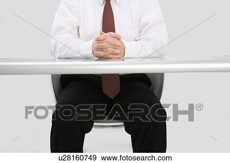 Businessman at desk View Large Photo Image Stock Photo - Businessman at desk. Fotosearch