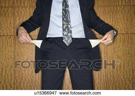 Businessman Holding Out Empty Pockets View Large Photo Image Stock Photo - Businessman Holding Out Empty Pockets. Fotosearch