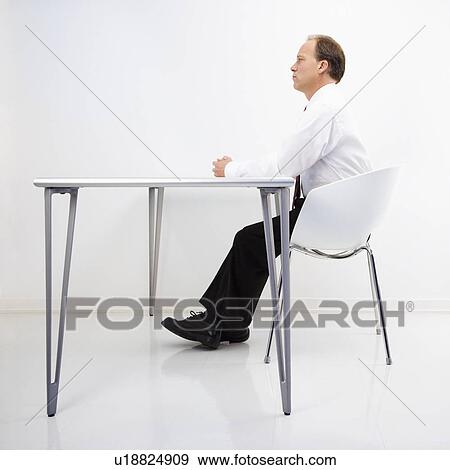 Stock Photo - Businessman in office. Fotosearch