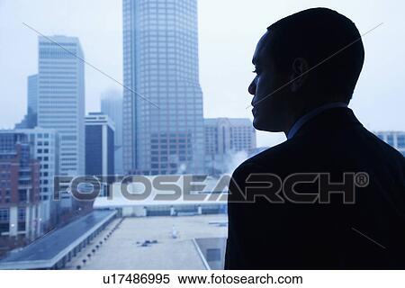 Businessman Looking Through a Window View Large Photo Image Stock Photography - Businessman Looking Through a Window. Fotosearch