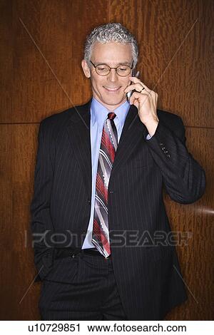 Businessman on Cellphone View Large Photo Image Stock Image - Businessman on Cellphone. Fotosearch