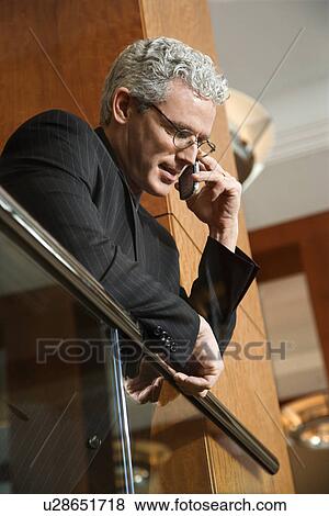 Stock Photo - Businessman on Cellphone. Fotosearch