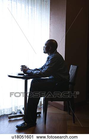 Businessman Sitting by Cafe Window View Large Photo Image Stock Image - Businessman Sitting by Cafe Window. Fotosearch