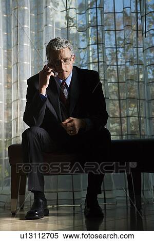 Stock Photography - Businessman Talking on Cellphone. Fotosearch