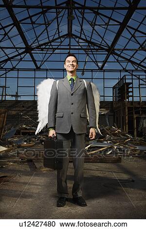Businessman Wearing Angel Wings View Large Photo Image Stock Image - Businessman Wearing Angel Wings. Fotosearch