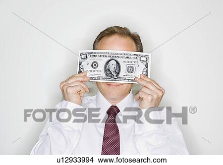 Businessman with cash View Large Photo Image Picture - Businessman with cash. Fotosearch