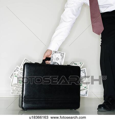 Businessman with cash View Large Photo Image Stock Image - Businessman with cash. Fotosearch